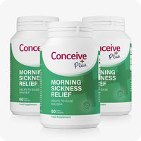 Three bottles of Conceive Plus Morning Sickness Relief, each containing 60 vegan capsules. Green and white label highlights product’s purpose to help reduce nausea during early pregnancy.